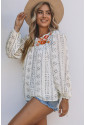 Bohemian loose white blouse with floral embroidery