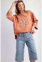  Flower Patch Graphic Exposed Seam Wide Sleeve Top